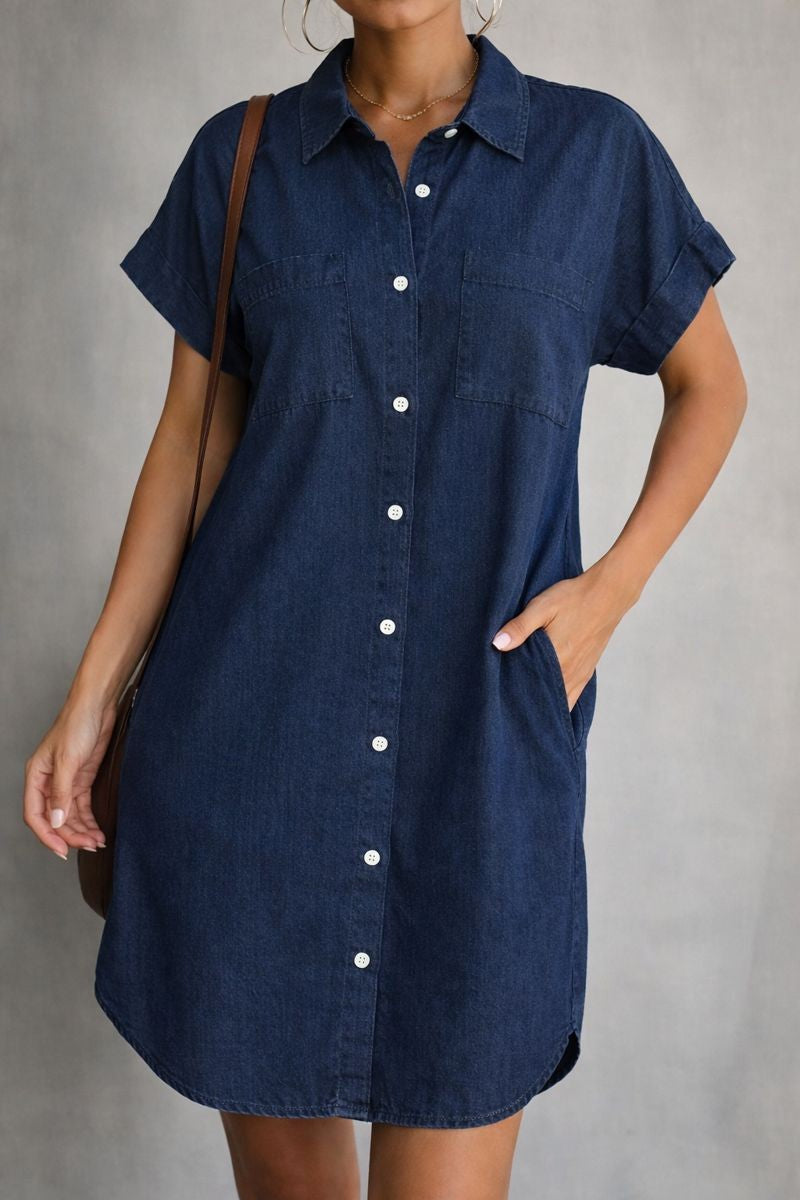 Navy denim shirt dress with rolled short sleeves and pearl button closure