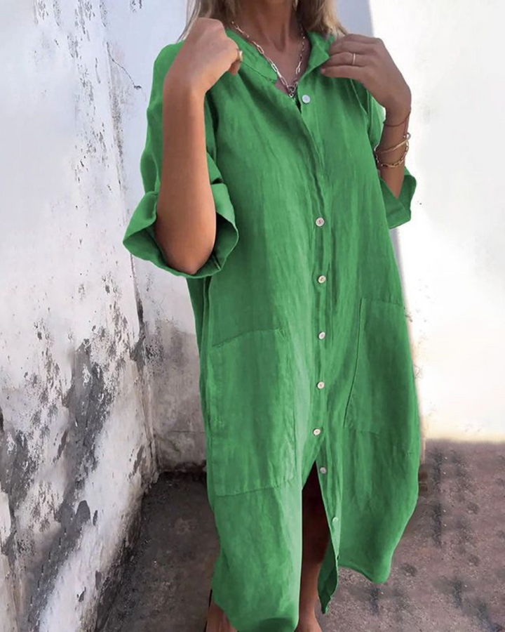 Green button-front midi shirt dress with relaxed sleeves and patch pockets