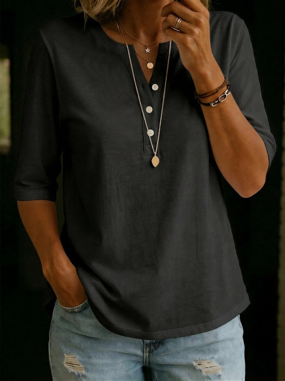 Charcoal gray Henley top featuring button front and relaxed fit