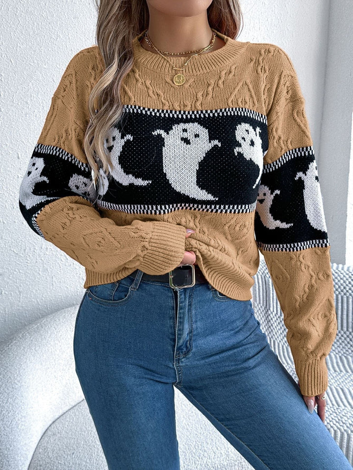 Camel cable-knit sweater featuring ghost print stripe, styled with denim jeans