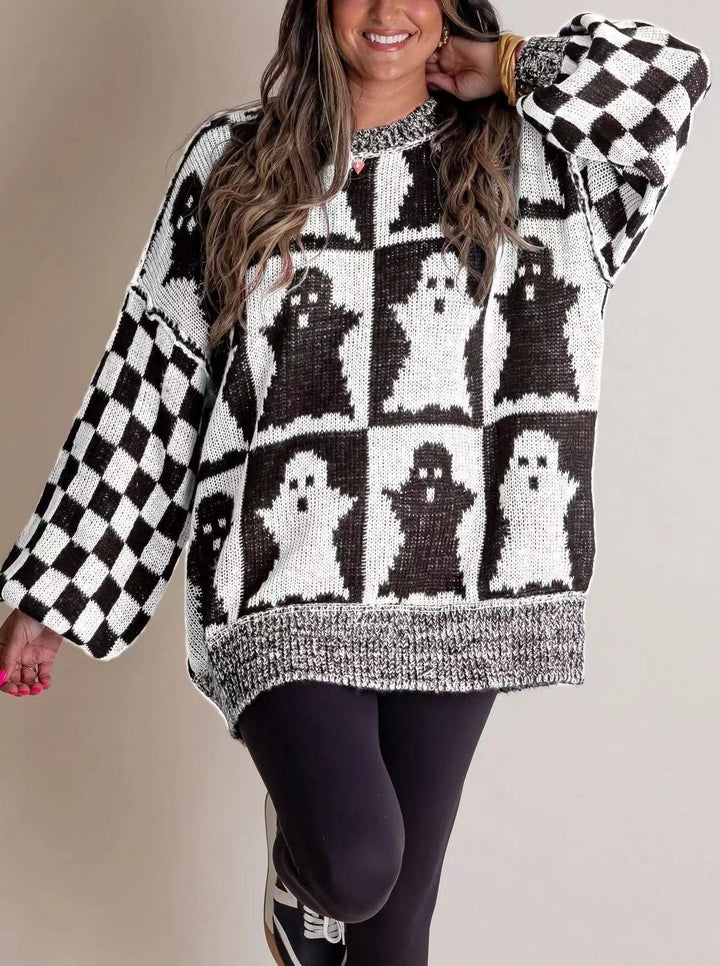 black and white checkered knit sweater with allover ghost print detail