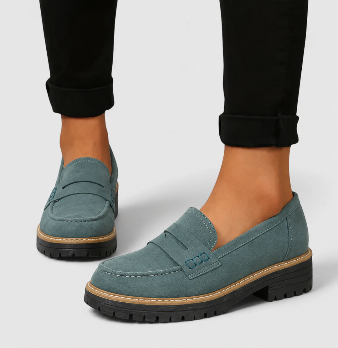 Teal suede penny loafers with lug sole and tonal stitch detail