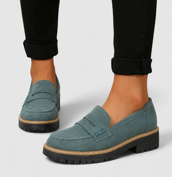Teal suede penny loafers with lug sole and tonal stitch detail