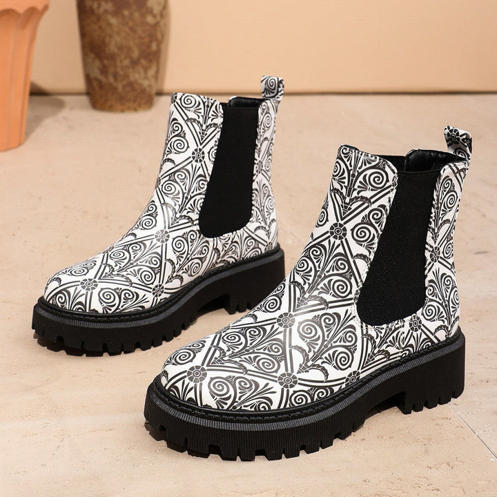 Chunky Chelsea boots in black and white swirl print with lug sole