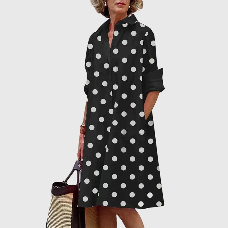 Black and white polka dot shirt dress with rolled sleeves and swing hem