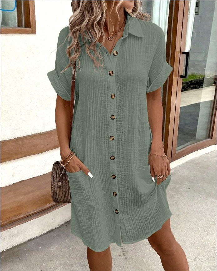 sage green button-front shirt dress with rolled cuffs and side pockets