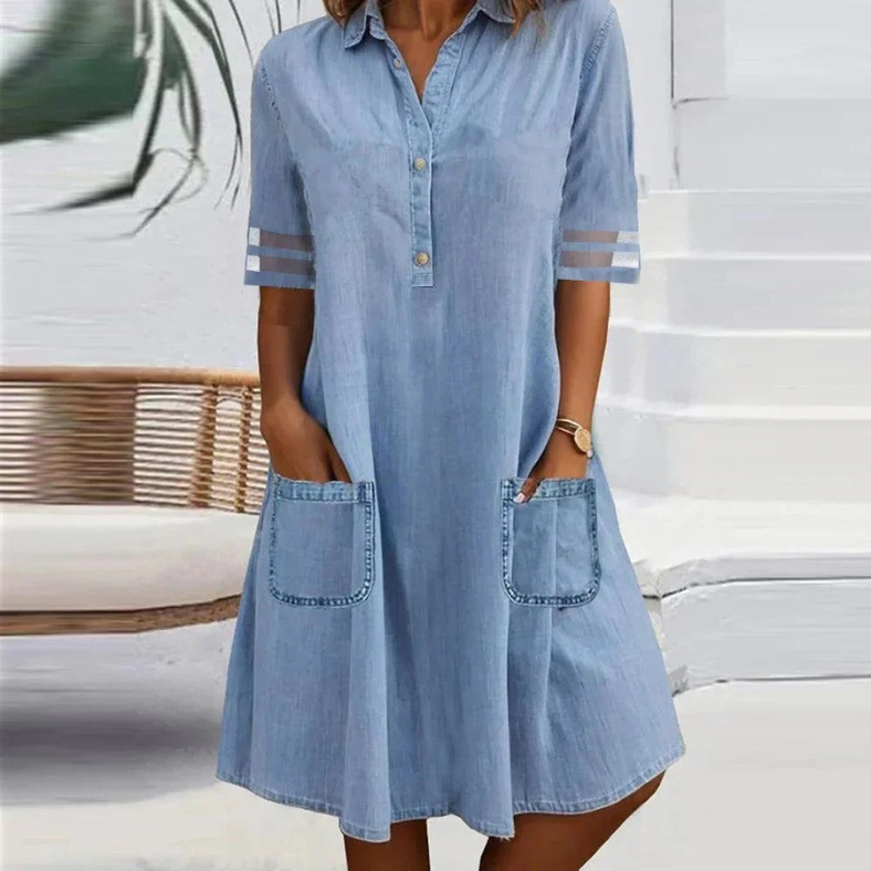 Light blue denim shirt dress with button front and patch pockets