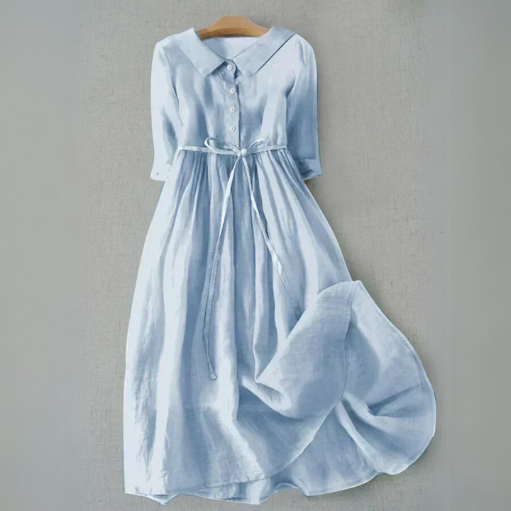 Light blue linen shirt dress with collar, half sleeves, and tie waist belt