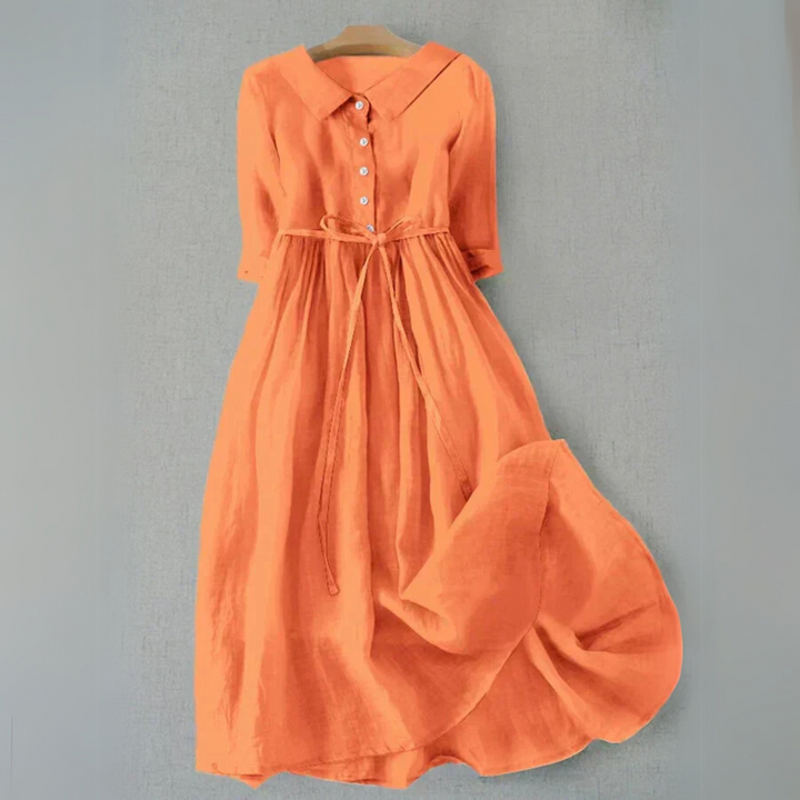 Orange linen midi shirt dress featuring button front and drawstring waist