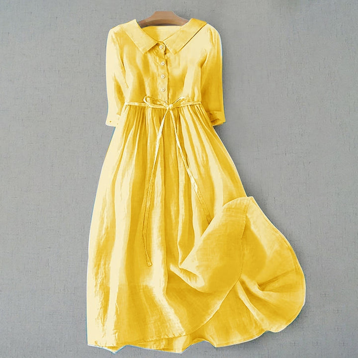 Yellow linen shirt dress with collared neckline and drawstring waist