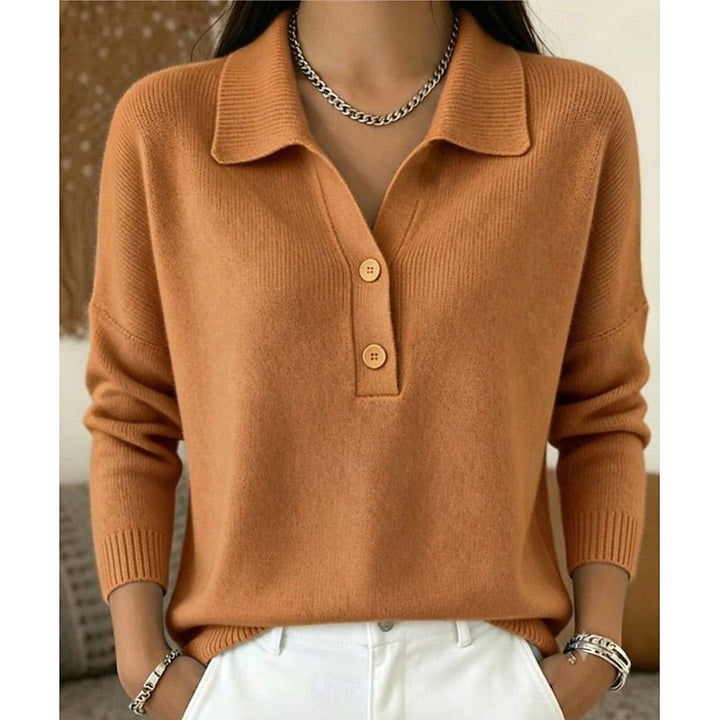 Rust orange knitted polo jumper with relaxed fit and buttoned collar