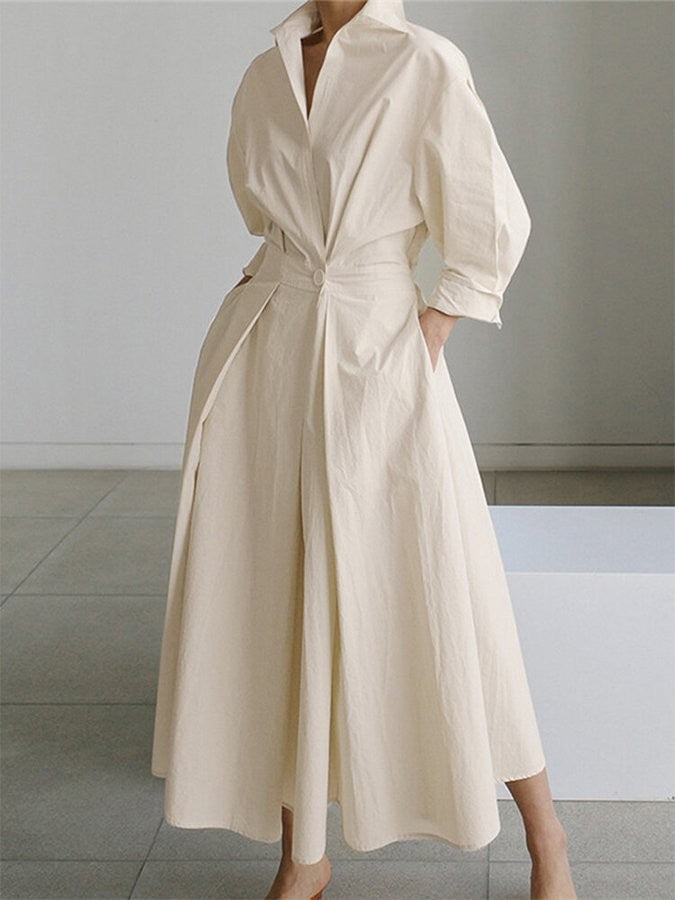 cream shirt collar maxi dress with cinched waist and full pleated skirt