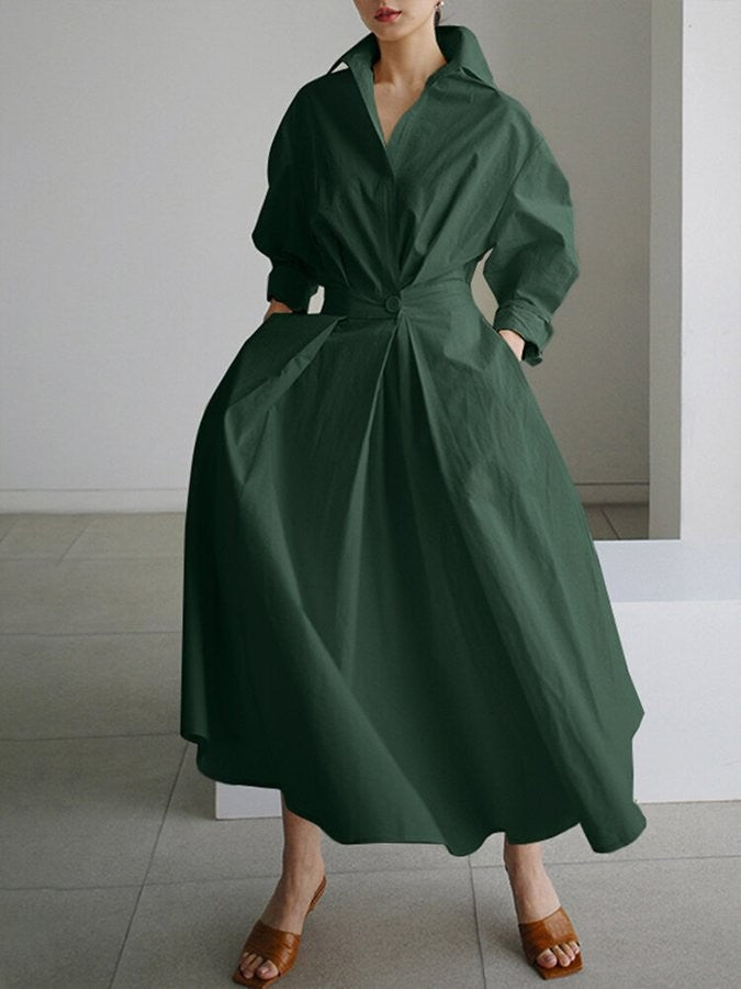 dark green collared maxi dress with cinched waist and flowing skirt
