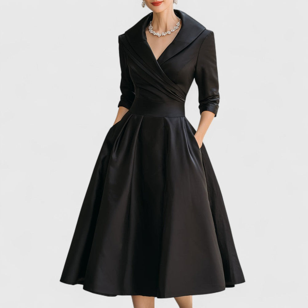 Black satin fit-and-flare midi dress with shawl collar and pockets