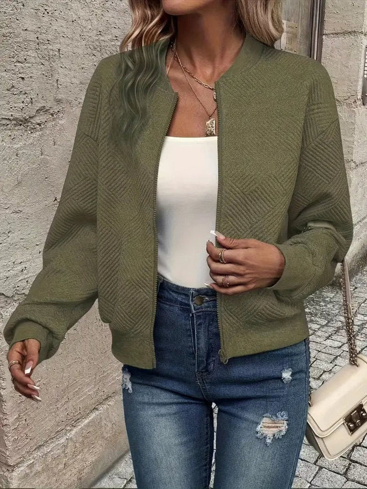 Khaki green cropped bomber jacket with ribbed trim and zip fastening
