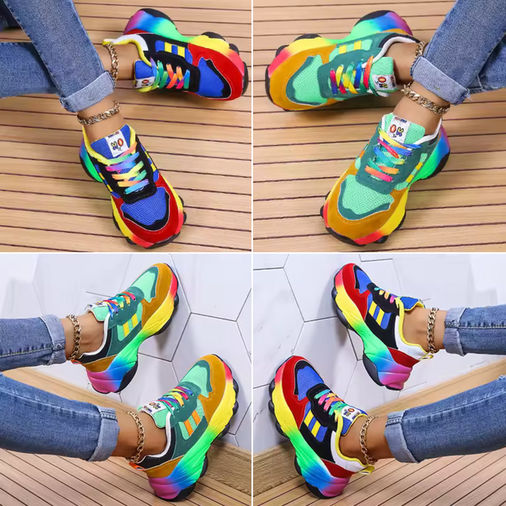 Colorful chunky sneakers with blue mesh upper and rainbow gradient platform sole