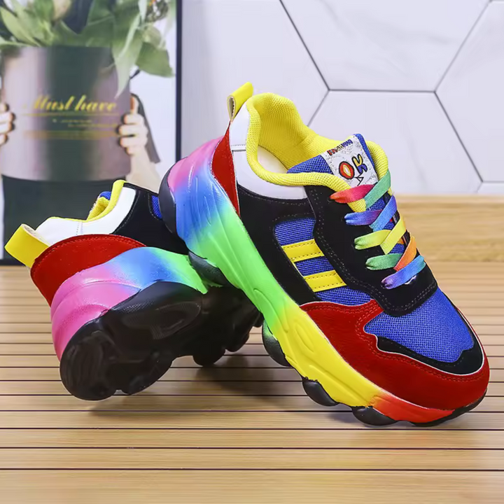 Close-up of rainbow chunky sneaker outsole showing textured rubber tread pattern
