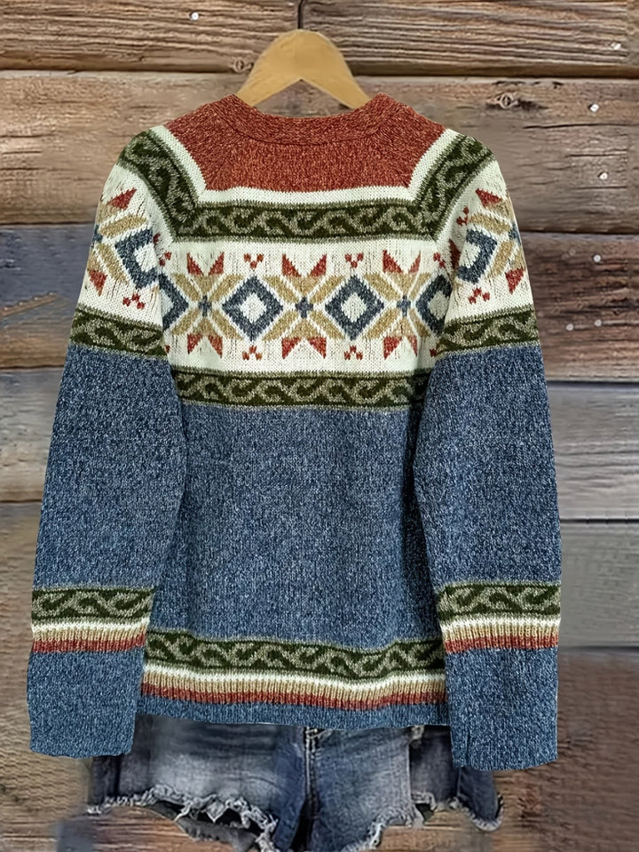 Blue Fair Isle cardigan back view showing rust shoulder panel and diamond motif