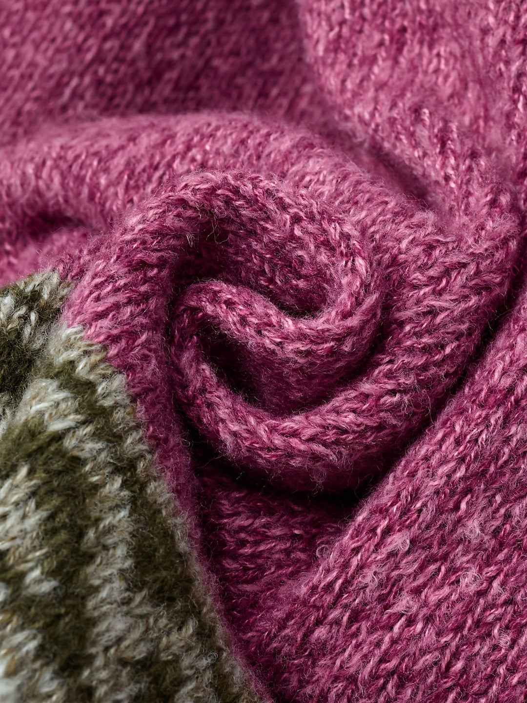Close-up of purple ribbed cuff with striped patterned trim detail