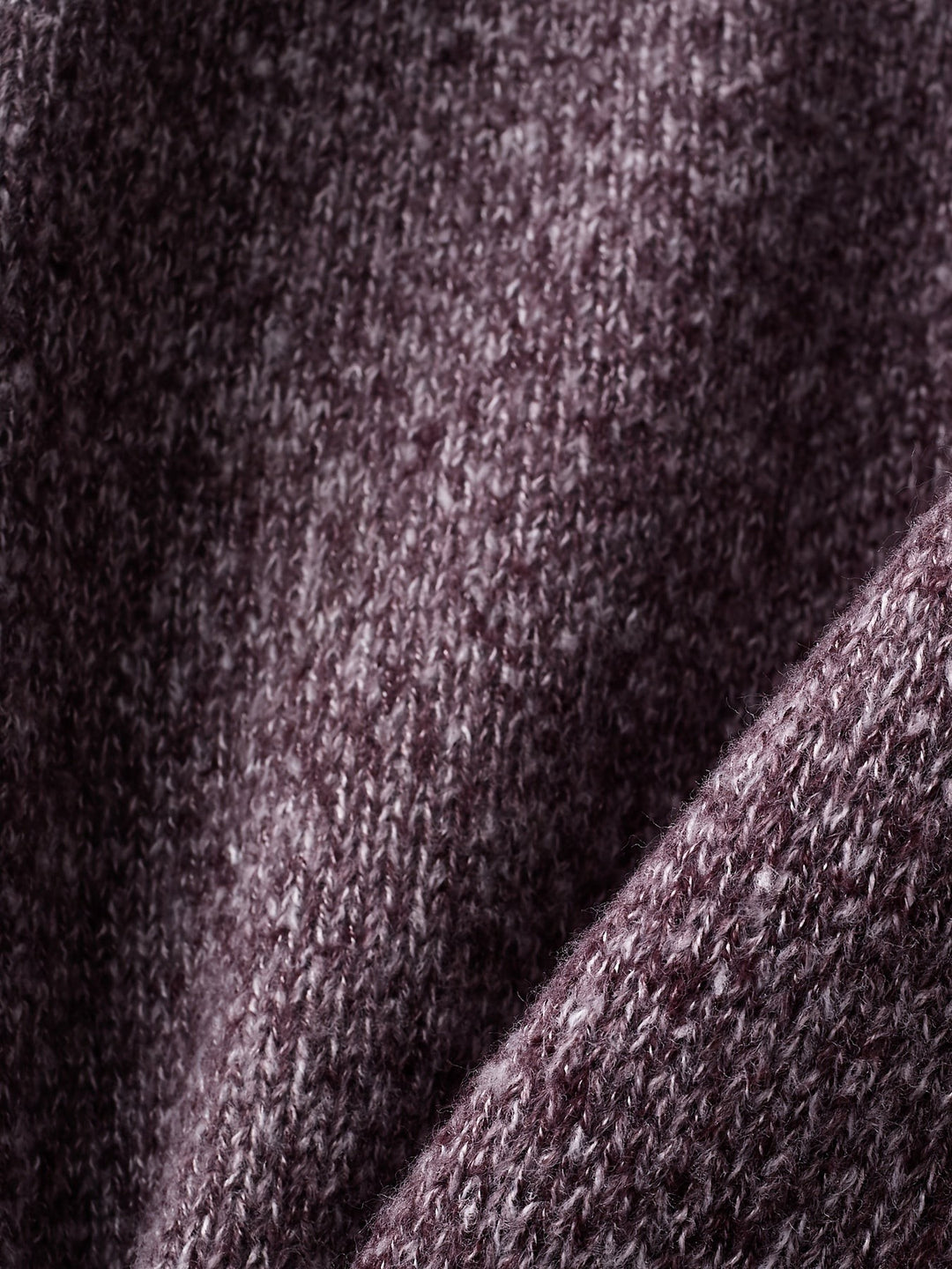 Purple Fair Isle cardigan back view on hanger, rust shoulder yoke