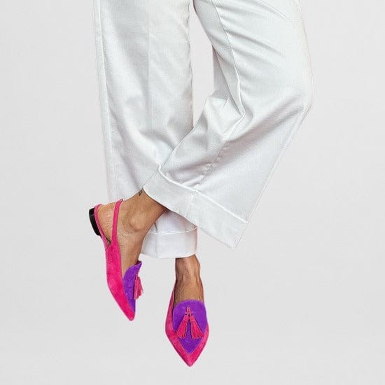 Pink and purple suede pointed-toe slingback flats with fringe tassel accent