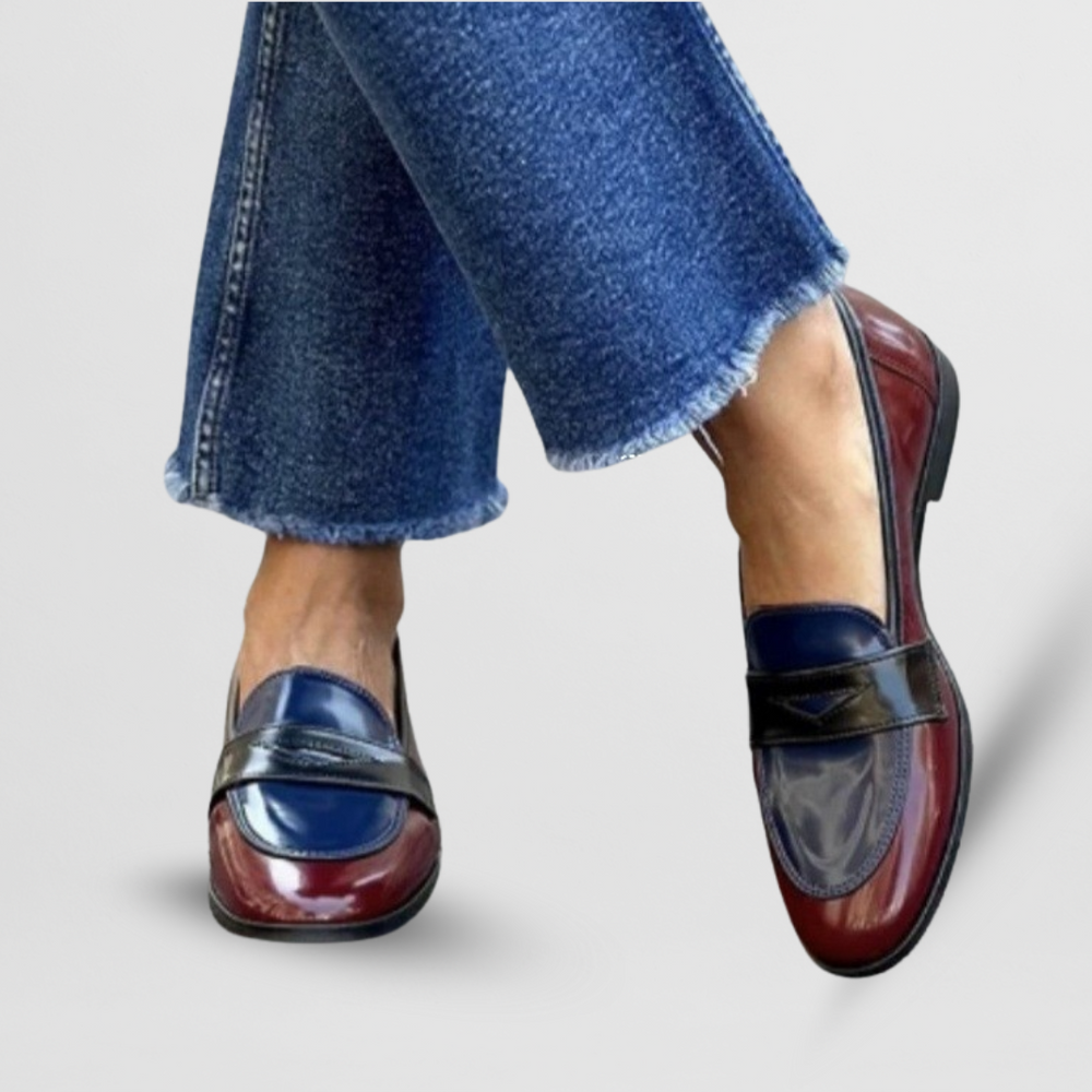Burgundy and navy patent leather penny loafers with glossy color-block design