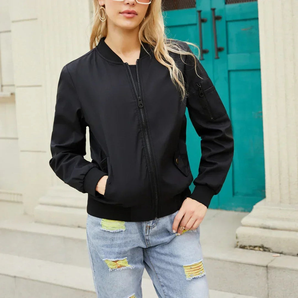 Black bomber jacket with contrast ribbed cuffs and zip chest pocket