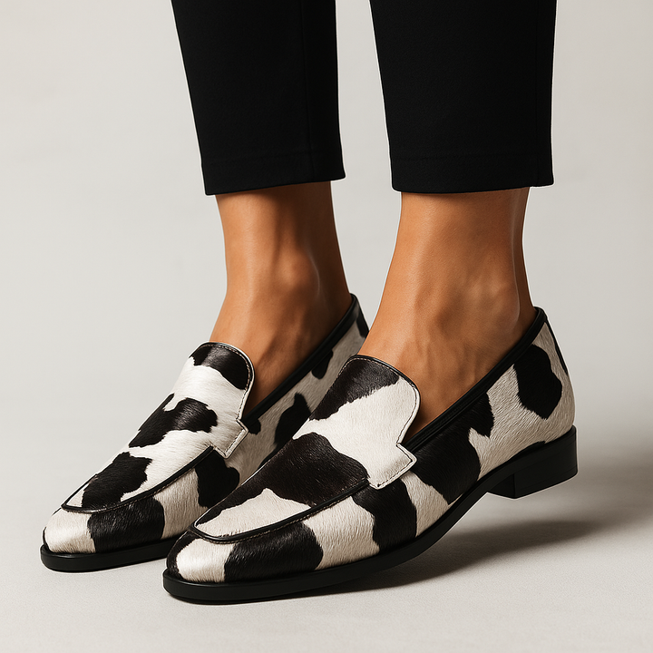 Cow print calf hair loafers with pointed toe and black trim