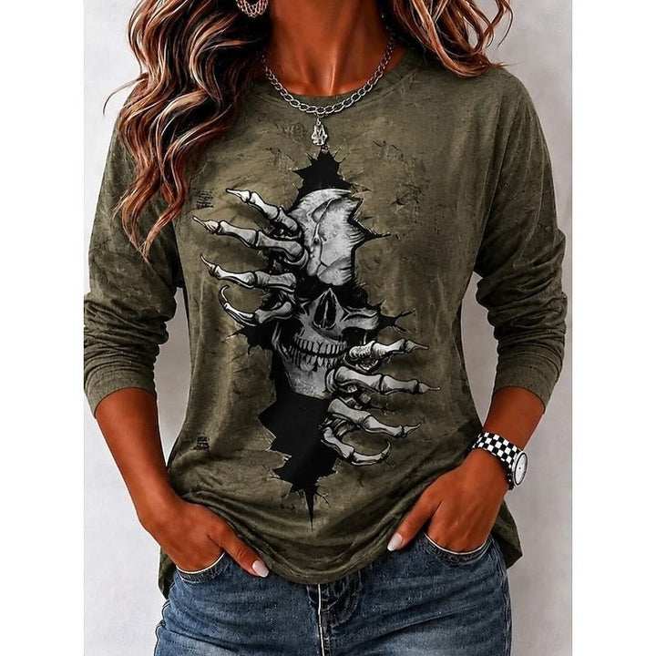 olive green long sleeve top with skeleton hand ripping skull graphic