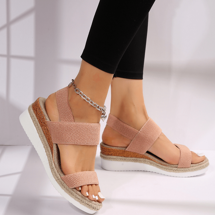 Blush pink espadrille sandal with crossover straps and chunky ankle chain