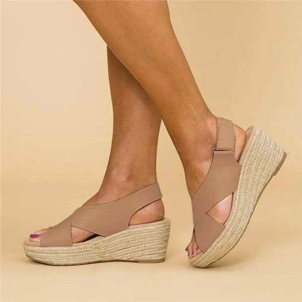 Taupe slingback wedge sandal featuring woven espadrille platform
