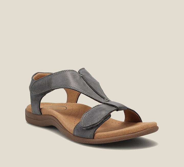 gray leather cushioned sandal with T-strap design and arch support sole