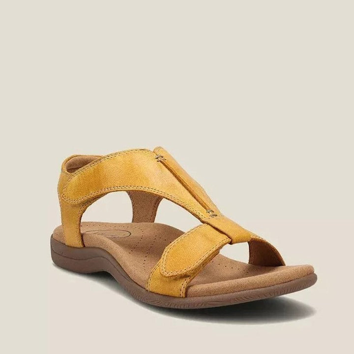 mustard yellow leather sandal with adjustable straps and cushioned insole