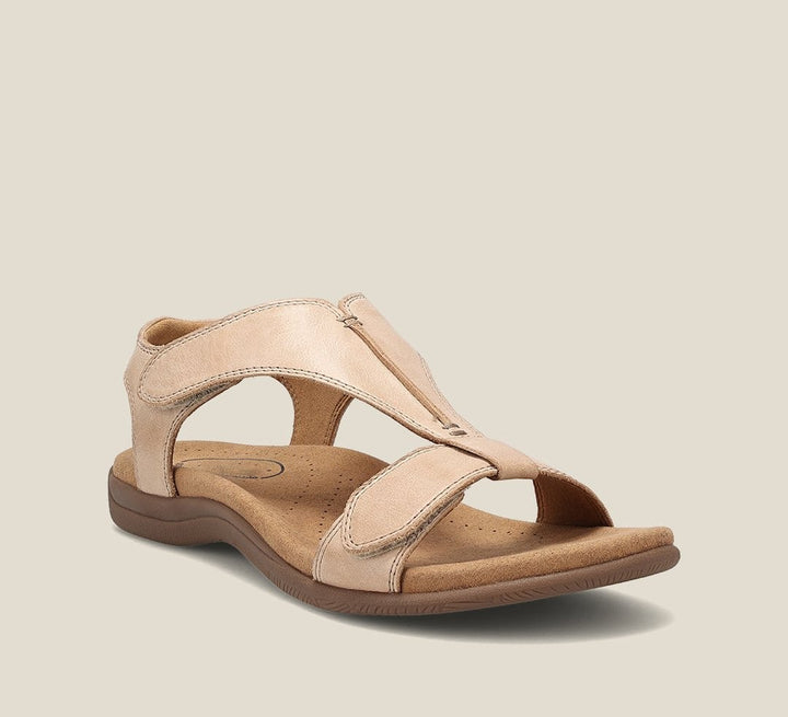 beige leather orthopedic sandal with crisscross strap and padded footbed