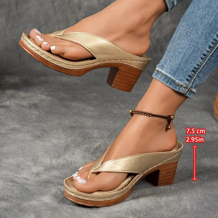Gold platform thong sandals featuring 2.95 inch stacked heel measurement