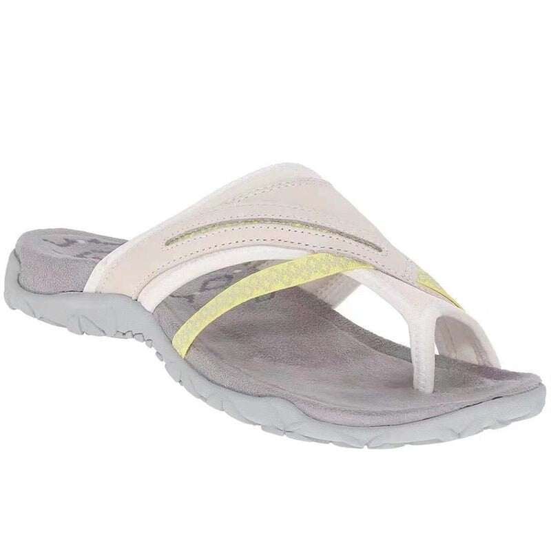 off-white leather thong sandal with yellow crisscross strap and gray sole