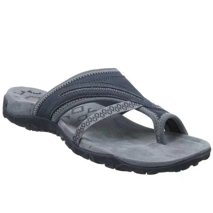 charcoal gray thong sandal with textured crisscross straps and gray footbed