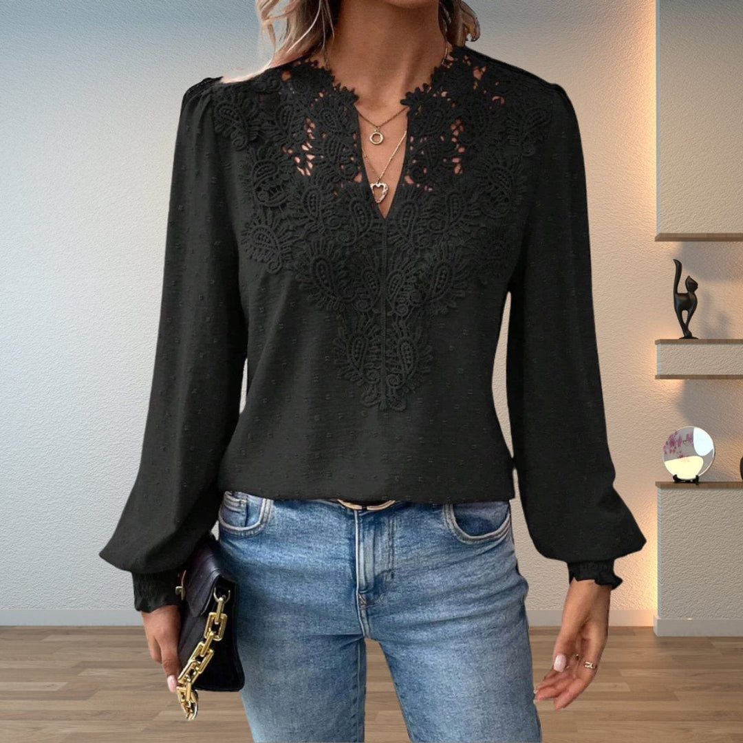 Black lace-bodice V-neck blouse featuring crochet trim and long lantern sleeves