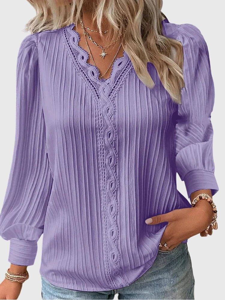 lavender pleated blouse featuring lace V-neck and puffed long sleeves