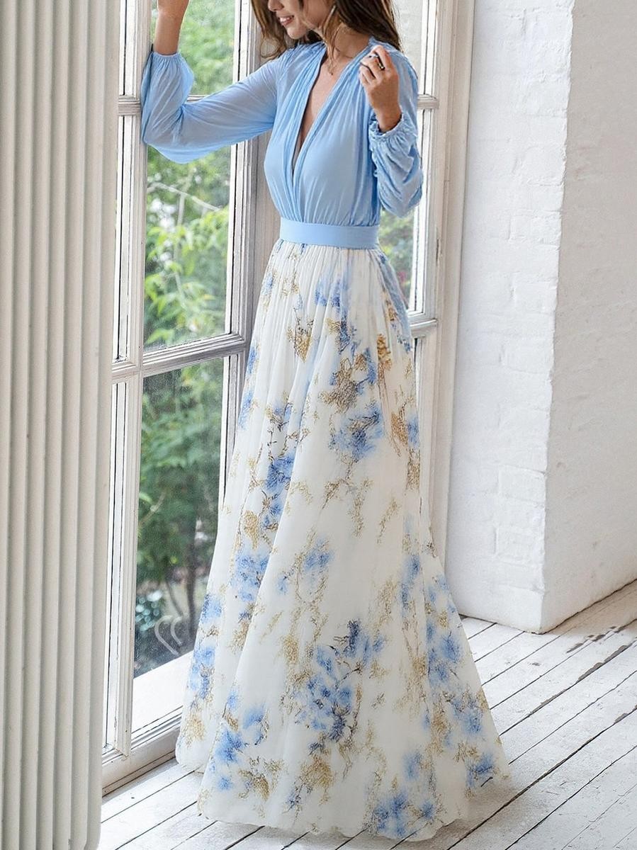 Deep V-neck maxi dress featuring long sleeves and floral chiffon skirt