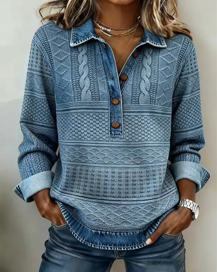 blue cable-knit sweater with denim collar and button placket