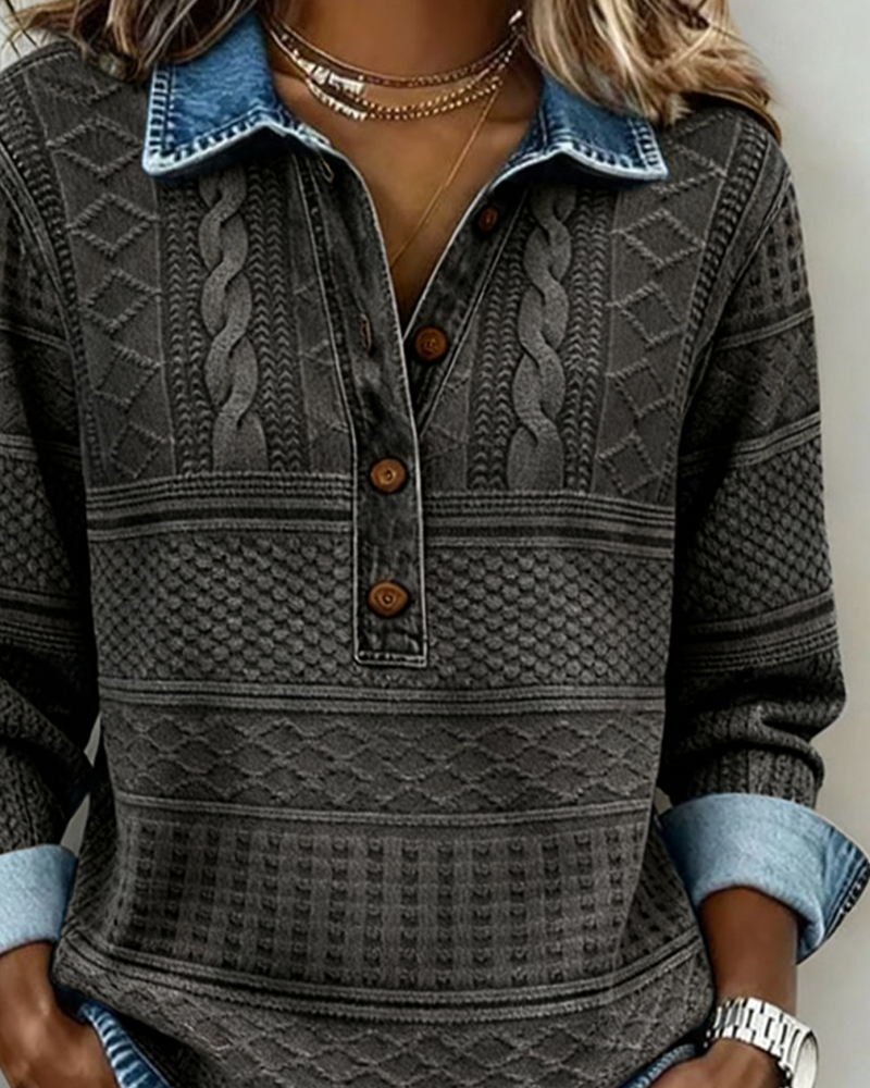 gray cable-knit sweater with denim collar and rolled cuffs