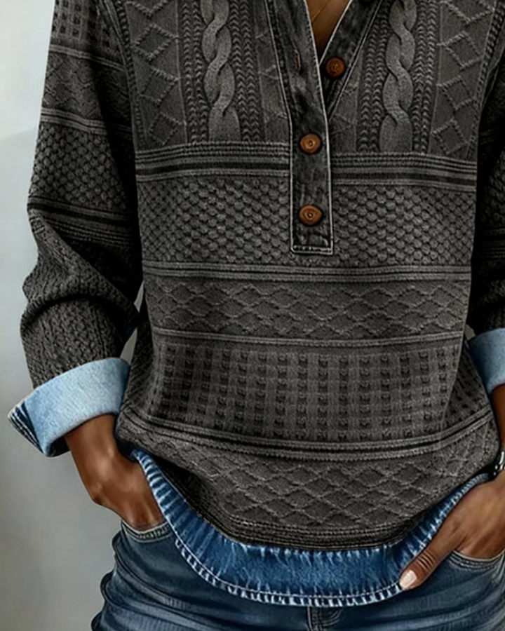 close-up view of gray knit top with button-front denim collar