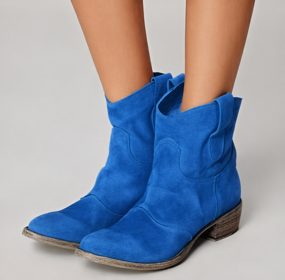 cobalt blue suede ankle boots with pointed toe and low heel