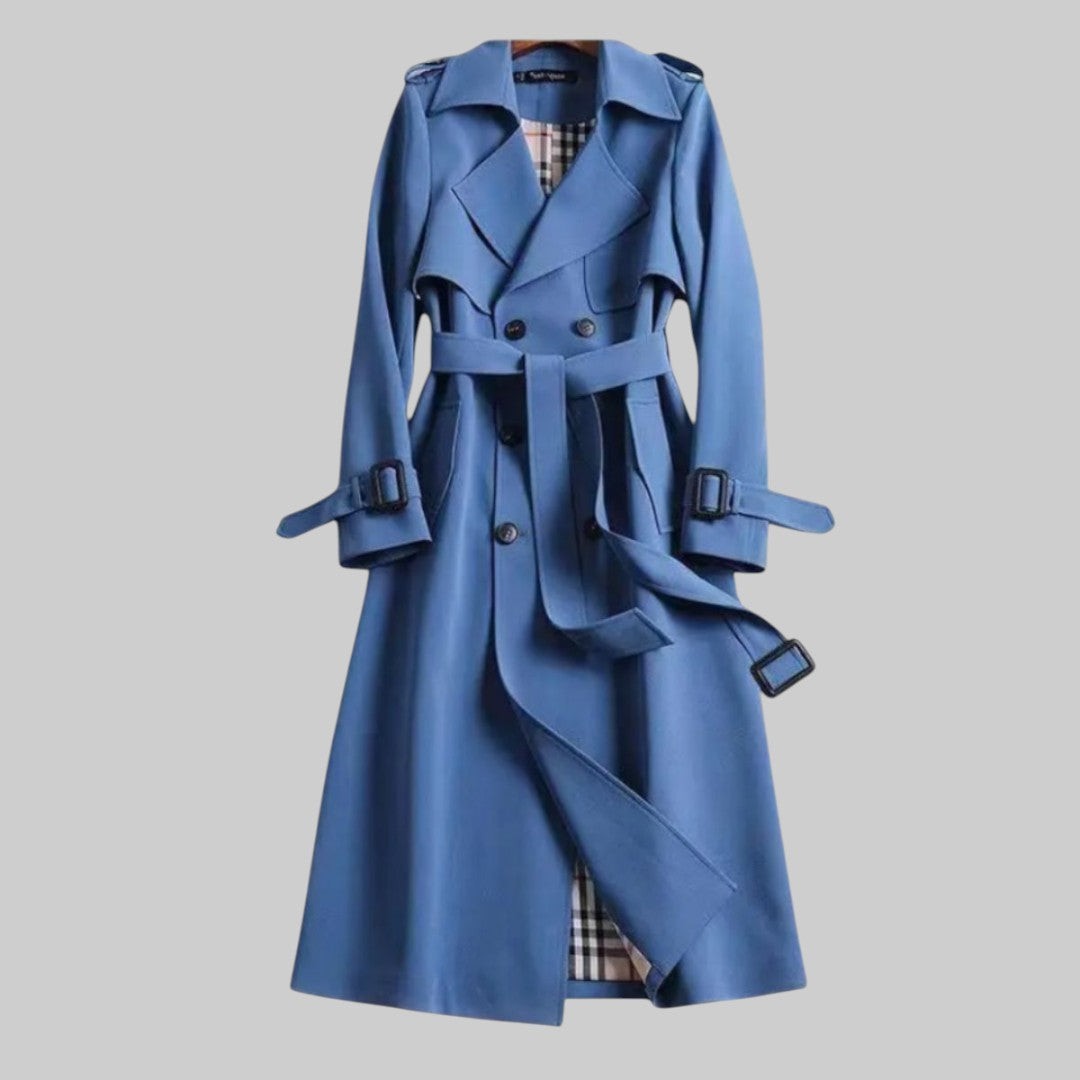 Blue double-breasted trench coat with buckled cuffs and belt