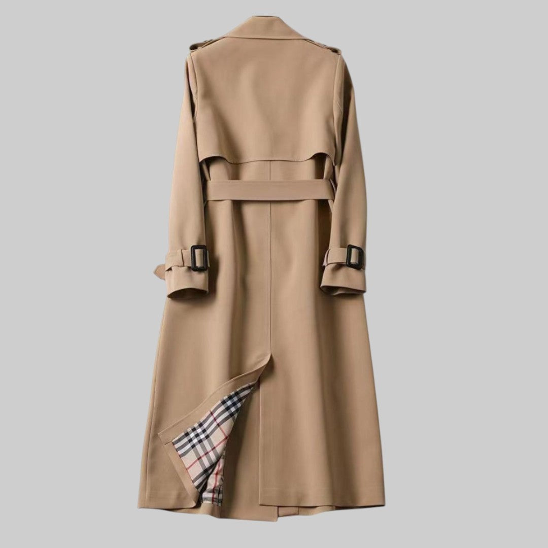 Camel trench coat back view showing belted waist and vent slit