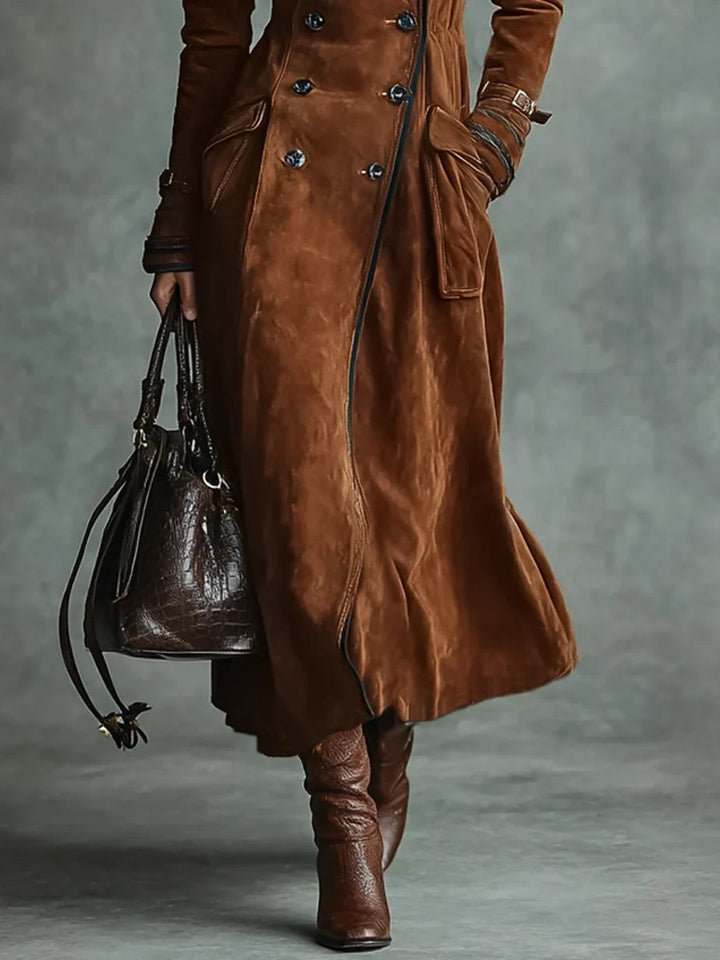 Hem and pocket detail on tan suede longline coat with leather boots