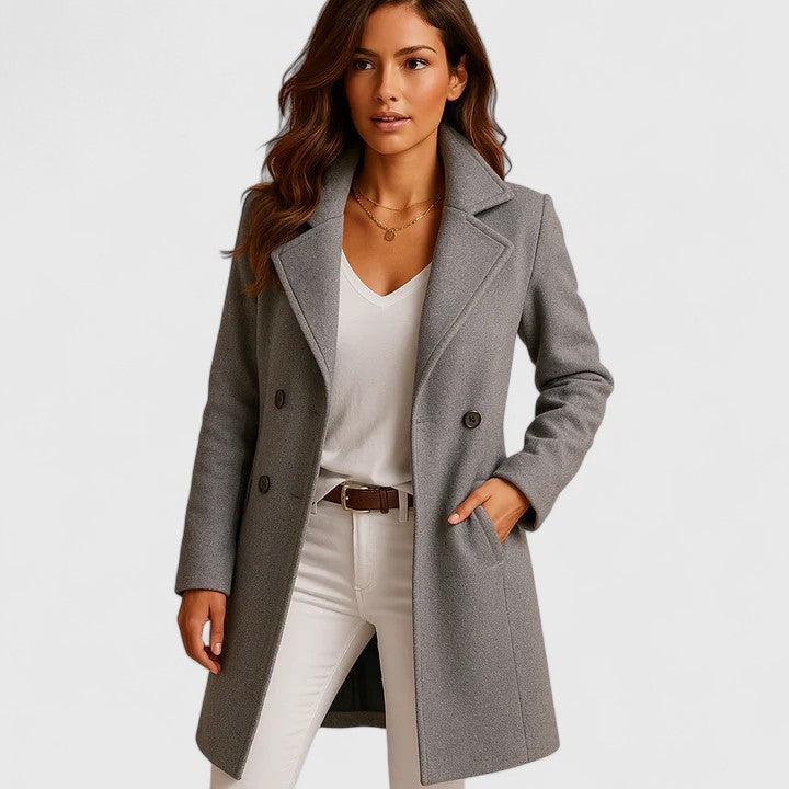 Gray double-breasted wool coat with lapel collar paired with white top