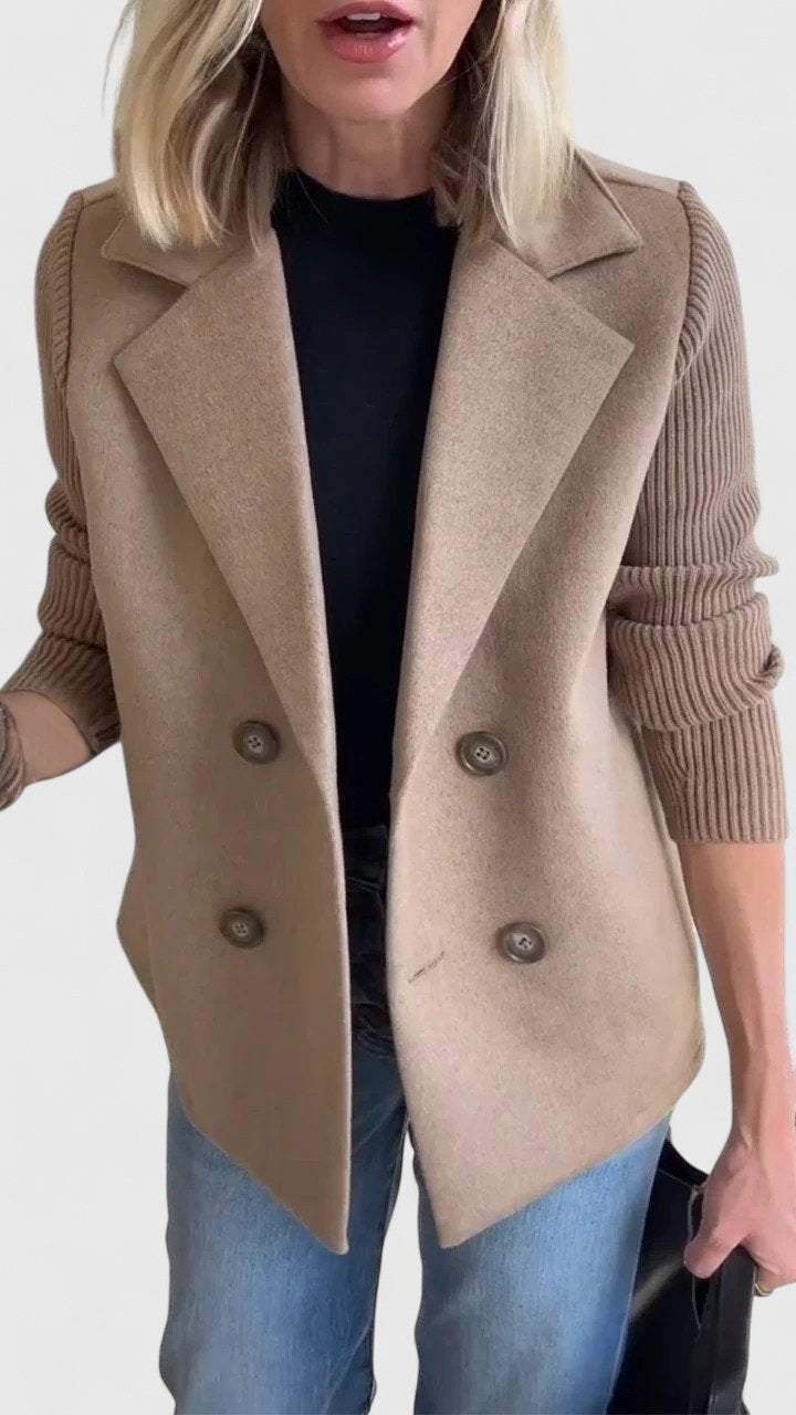 Close-up of camel double-breasted blazer with ribbed sleeve and lapel detail