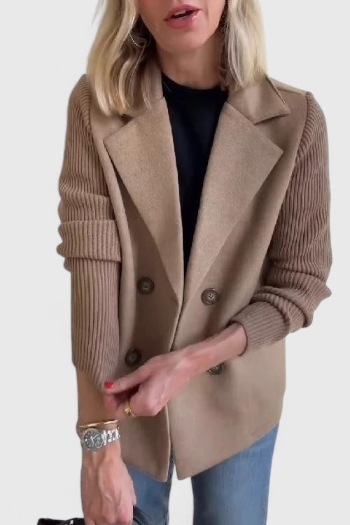 Beige tailored blazer with ribbed knit sleeves and double-breasted buttons